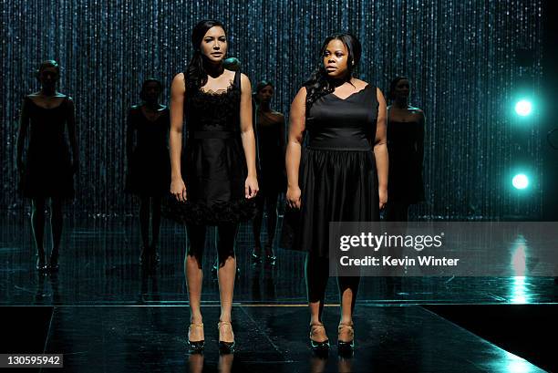 Actors Naya Rivera and Amber Riley perform at the "GLEE" 300th musical performance special taping at Paramount Studios on October 26, 2011 in Los...