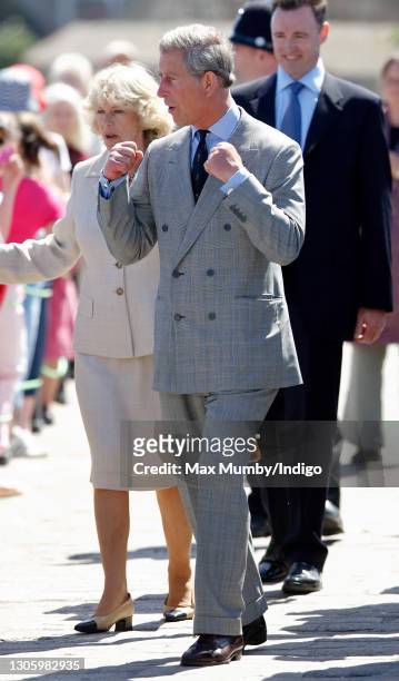 Prince Charles, Prince of Wales and Camilla, Duchess of Cornwall during a walkabout in Hugh Town, on the island of St Mary's on May 20, 2005 in Isles...