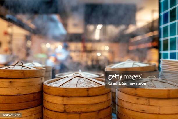 variety of chinese dimsum in bamboo steamers - steamer stock pictures, royalty-free photos & images