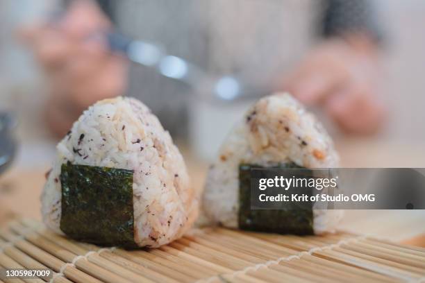 close-up view of cooked rice balls - rice ball stock pictures, royalty-free photos & images