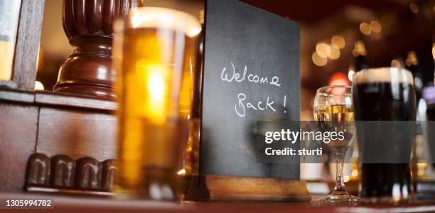 pub reopening sign - coronavirus restaurant stock pictures, royalty-free photos & images