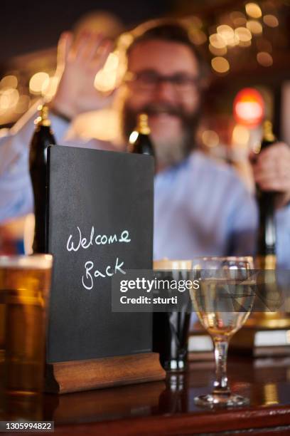 welcome back pub drinkers - reopening banner stock pictures, royalty-free photos & images