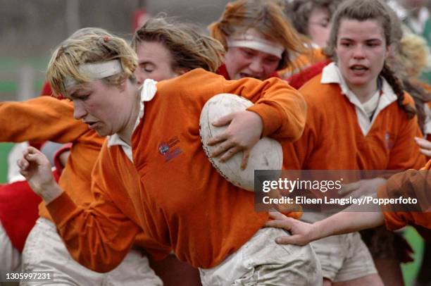 Soviet Rugby A Netherlands player makes a run with the ball during play in the ...