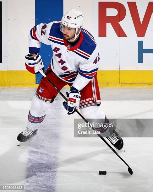 Brendan Smith of the New York Rangers looks to pass in the second period against the New Jersey Devils at Prudential Center on March 06, 2021 in...