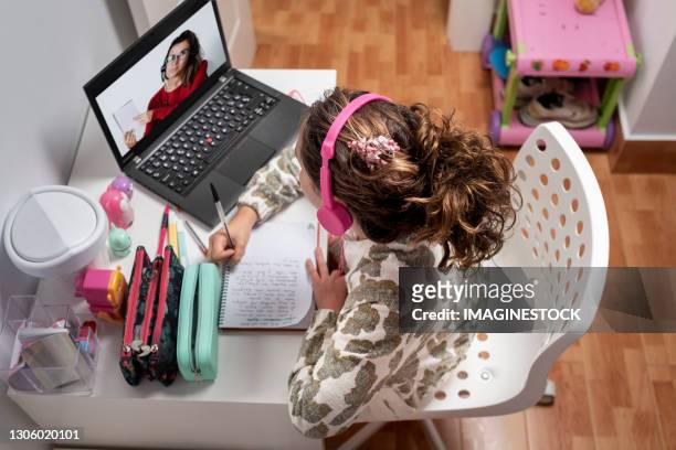 distance learning at home with teacher teaching remotely - online coach stock pictures, royalty-free photos & images