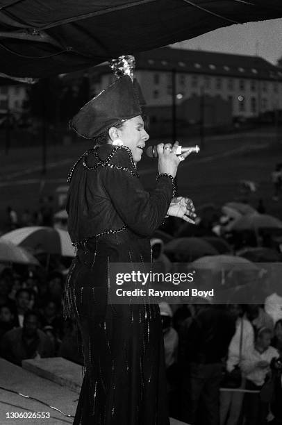 Singer Alyson Williams performs on an army base during the V-103 FM Chicago USO Trans-Atlantic Jam in Pirmasens, West Germany in June 1990.