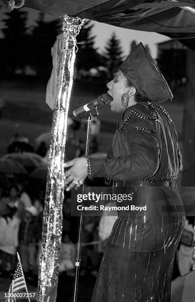 Singer Alyson Williams performs on an army base during the V-103 FM Chicago USO Trans-Atlantic Jam in Pirmasens, West Germany in June 1990.