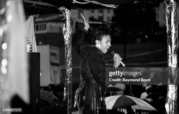 Singer Alyson Williams performs on an army base during the V-103 FM Chicago USO Trans-Atlantic Jam in Pirmasens, West Germany in June 1990.