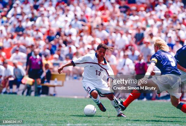 Cobi Jones of USA and Colin Hendry of Scotland in action during the Friendly match between Scotland and USA at RFK stadium on May 30 1998 in...