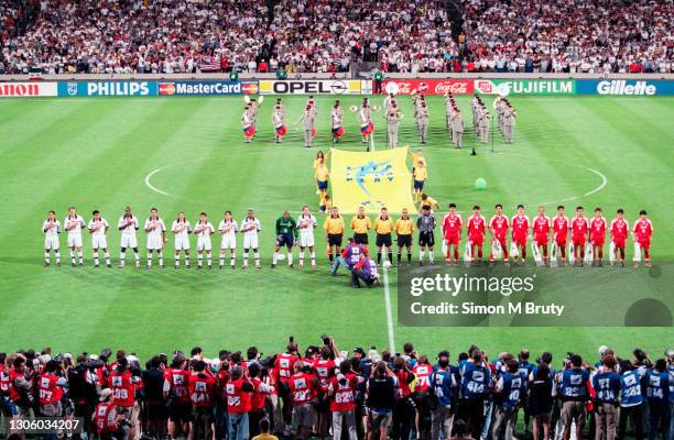 Iran and USA soccer teams line up before the World Cup 1st round match between USA and Iran at the Parc Olympique on June 21, 1998 in Lyon, France.