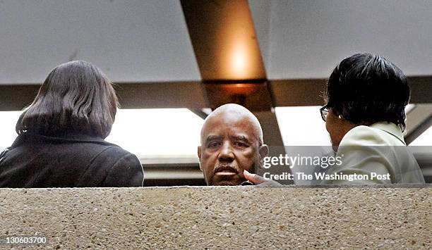 Rockville, MD Family members of accused murderer Brittany Norwood talk outside the courtroom as jury selection begins in her trial, on October 2011...