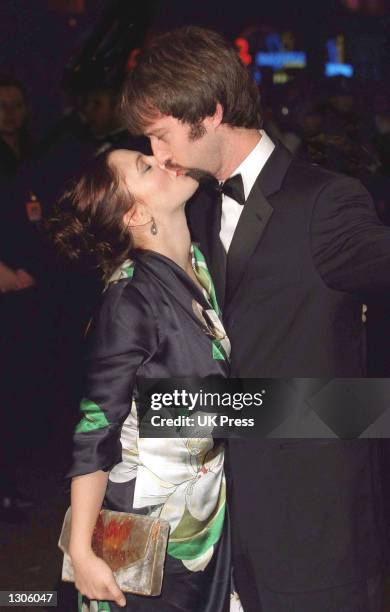Actress Drew Barrymore and her then-boyfriend comedian Tom Green kiss at the Royal Charity premiere of "Charlie''s Angels" November 22, 2000 in...