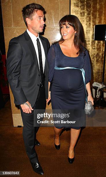 Harry Kewell and his wife actress Sheree Murphy pose during the launch of the upgraded and expanded Mahogany Room at the Crown on October 27, 2011 in...