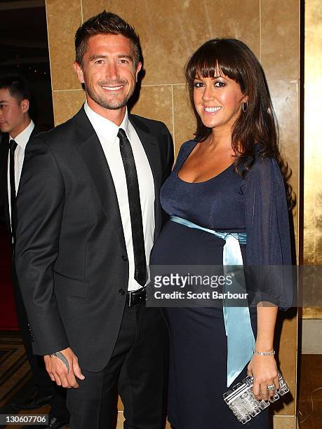 Harry Kewell and his wife actress Sheree Murphy pose during the launch of the upgraded and expanded Mahogany Room at the Crown on October 27, 2011 in...
