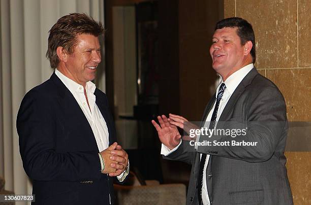 Australian businessman James Packer talks with Richard Wilkins during the launch of the upgraded and expanded Mahogany Room at the Crown on October...