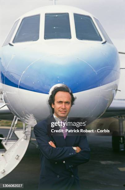 French businessman, politician, and composer Olivier Dassault before an airplane at Le Bourget Airport. Dassault, who owns Dassault Falcon Service,...