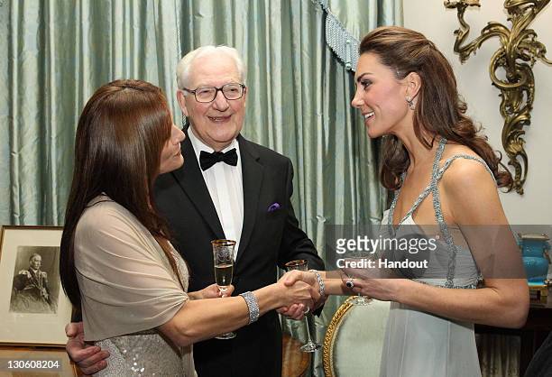 In this handout photo provided by Clarence House, Catherine, Duchess of Cambridge speaks to guests as she attends an event in support of the 'In Kind...