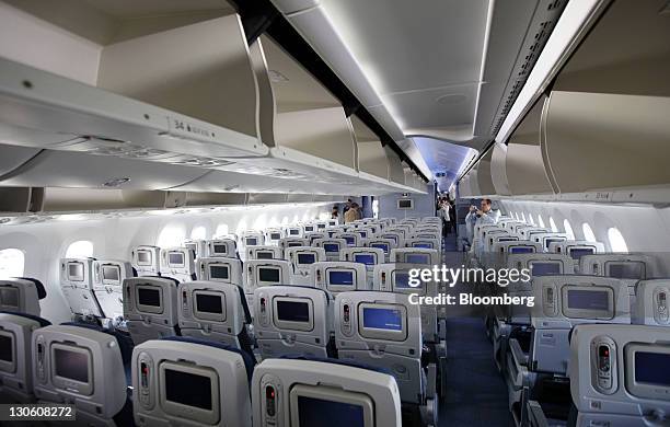 The economy class cabin of a Boeing Co. 787 Dreamliner for All Nippon Airways Co. Is seen in Narita City, Chiba Prefecture, Japan, on Wednesday, Oct....