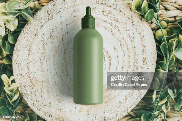 green eco cosmetic bottle mock up top view - biological product stock pictures, royalty-free photos & images