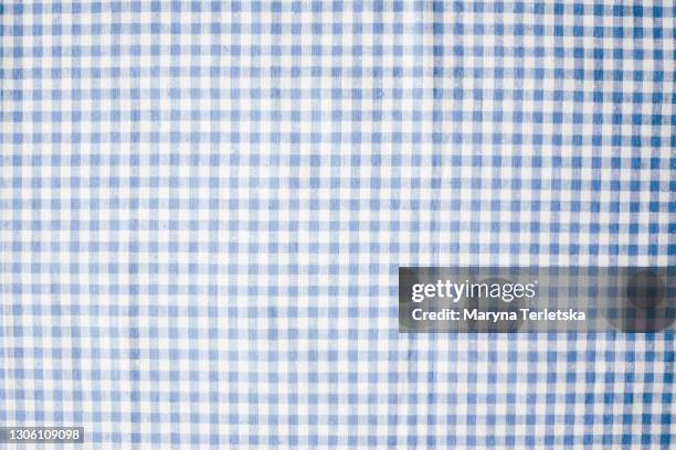 universal fabric background in a white-blue cage. - nappe photos et images de collection