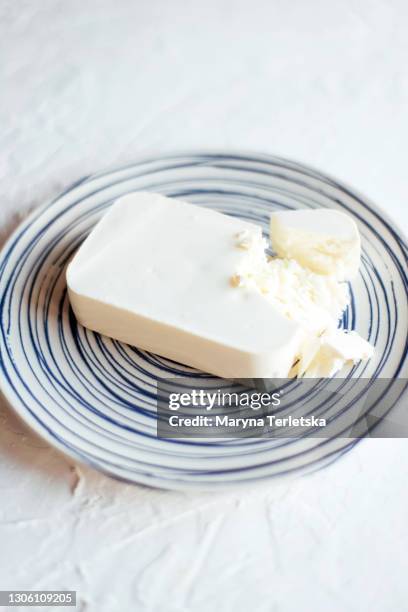 feta cheese on a beautiful plate - feta stockfoto's en -beelden