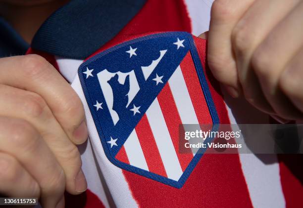 Displaying the Atlético Madrid club crest on the first team home shirt on March 7, 2021 in Manchester, United Kingdom.