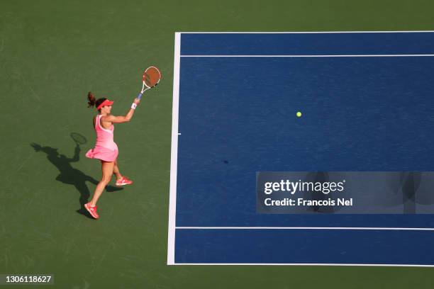Alize Cornet of France plays a forehand in her Round Two match against Aryna Sabalenka of Belarus during Day Three of the Dubai Duty Free Tennis...