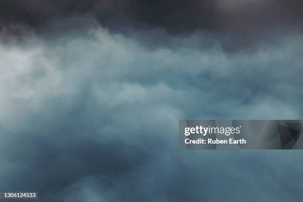 cloud and fog natural background blue color - brouillard photos et images de collection