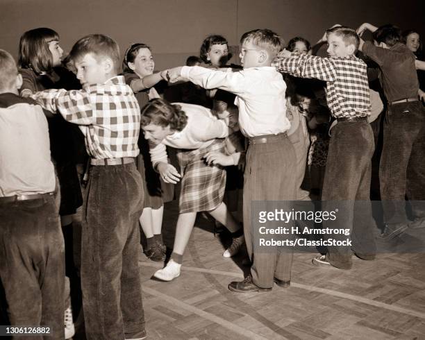 https://media.gettyimages.com/id/1306126882/photo/1950s-boys-and-girls-square-dancing-virginia-reel-walking-under-arch-of-linked-hands.jpg?s=612x612&w=gi&k=20&c=Q0haW-kcNds7ooXXDd7Fm6VVpTV7xr0vg2PND_53Zoc=