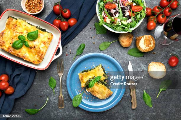 traditional lasagna for dinner - serving lasagna stock pictures, royalty-free photos & images