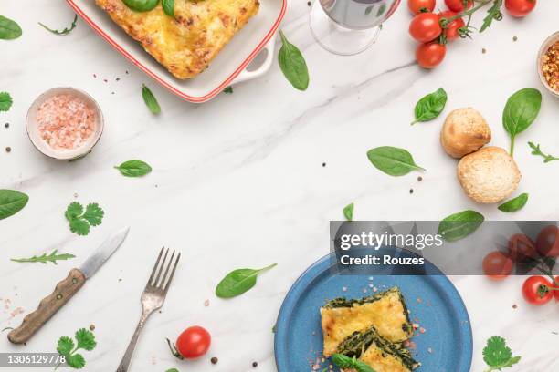homemade italian lasagna with spinach - serving lasagna stock pictures, royalty-free photos & images