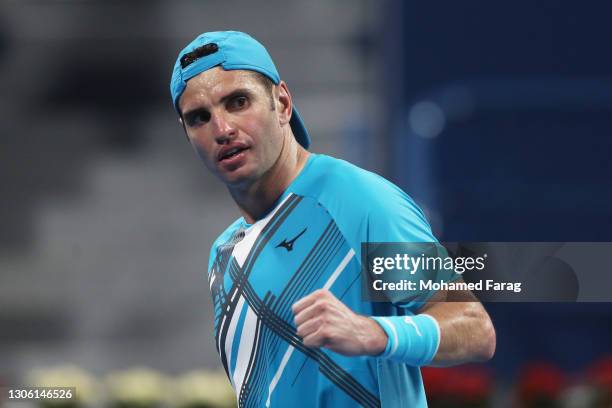 Malek Jaziri of Tunisia celebrates a point in his Round One match against Norbert Gombos of Slovakia during Day Two of the Qatar ExxonMobil Open 2021...