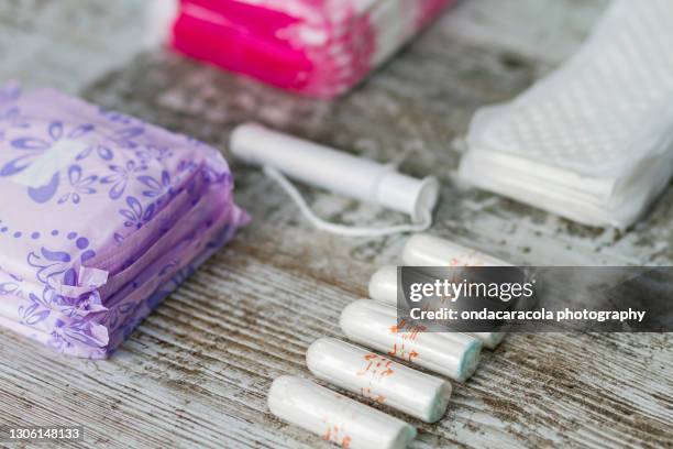 intimate feminine hygiene pads and tampons - menstruation stock pictures, royalty-free photos & images