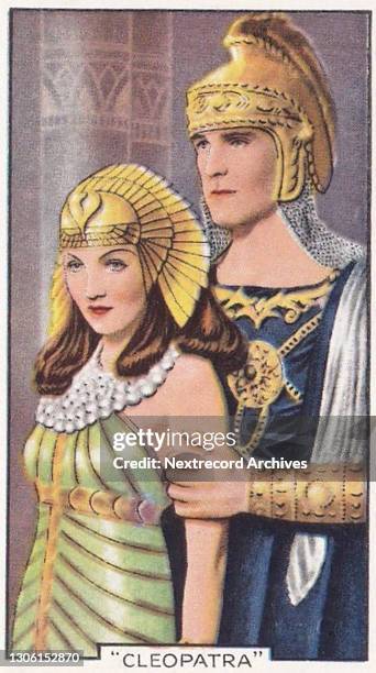 Collectible tobacco or cigarette card, 'Shots from Famous Films' series, published in 1935 by Gallaher Ltd, here actors Claudette Colbert and Henry...