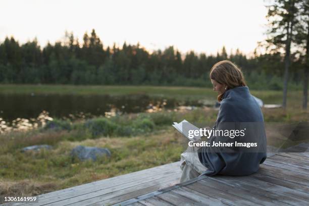 woman reading book - read book outside young woman bildbanksfoton och bilder