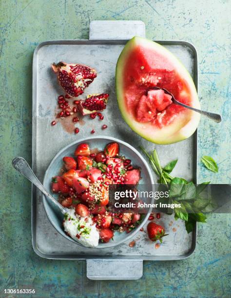 fresh fruits on metal tray - fruit salad stock pictures, royalty-free photos & images