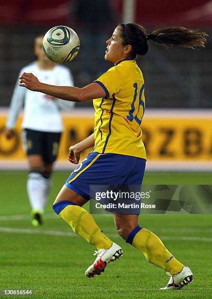 Madelaine Edlund of Sweden runs with the ball during the Women's International friendly match between Germany and Sweden on October 26, 2011 in...