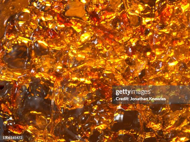 close up melting sugar - melting gold stock pictures, royalty-free photos & images