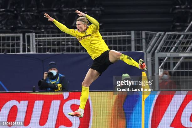 Erling Haaland of Borussia Dortmund celebrates after scoring their side's second goal from the penalty spot during the UEFA Champions League Round of...