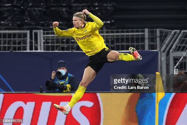 Erling Haaland of Borussia Dortmund celebrates after scoring their side's second goal from the penalty spot during the UEFA Champions League Round of...