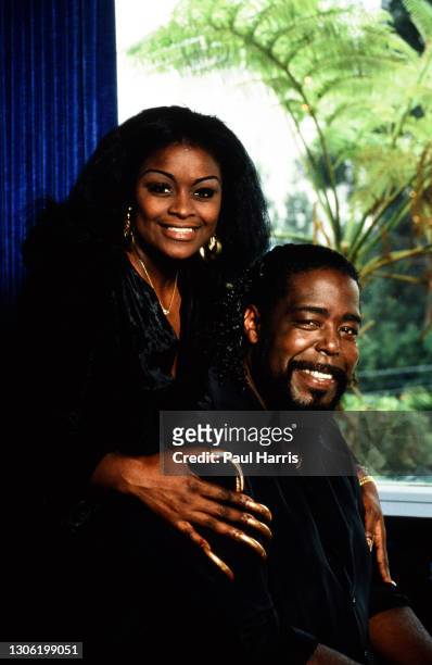 Singer Barry White and his wife Glodean pose at their home, White, later suffered from kidney failure and high blood pressure, died at the age of 58...