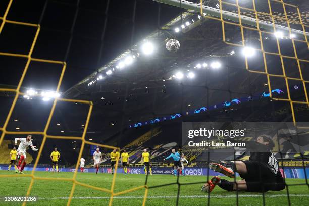 Youssef En-Nesyri of Sevilla scores their side's first goal from the penalty spot past Marwin Hitz of Borussia Dortmund during the UEFA Champions...