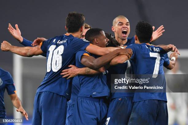 Sergio Oliveira of Porto celebrates with team mates after scoring their side's second goal during the UEFA Champions League Round of 16 match between...