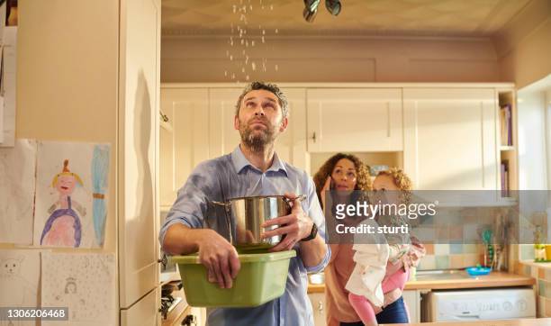 leaky pipe in the ceiling - accidents and disasters stock pictures, royalty-free photos & images
