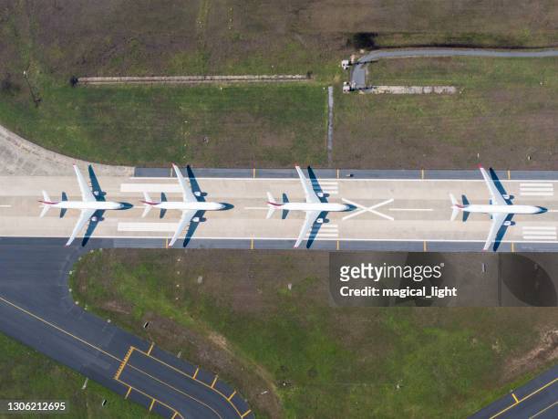 aerial view of an airport - air strip stock pictures, royalty-free photos & images
