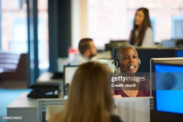 call center worker - call centre stock pictures, royalty-free photos & images