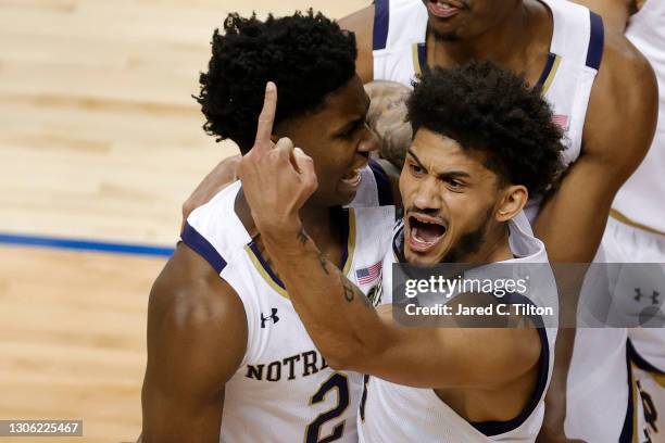 Prentiss Hubb of the Notre Dame Fighting Irish reacts following a game-winning three point basket by teammate Trey Wertz during the second half of...