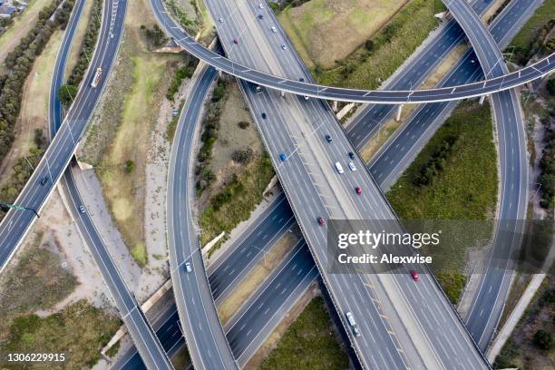 aerial busy freeway traffic - elevated road stock pictures, royalty-free photos & images