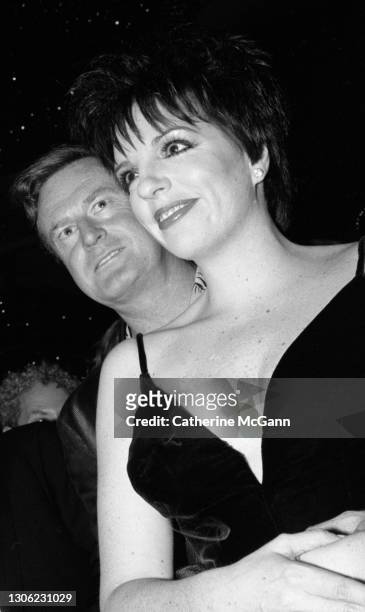 28th - American actress and singer, Liza Minnelli with former husband Australian songwriter and entertainer Peter Allen at an event at the Marriott...