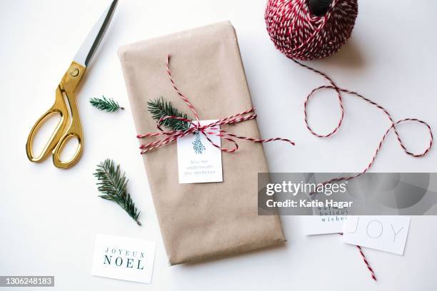 wrapping christmas presents - brown paper stock pictures, royalty-free photos & images